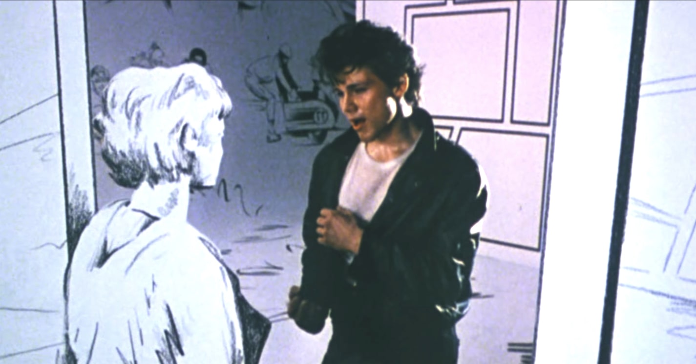 A clip from the Take On Me video, where the guy is 'real' and the woman is illustrated.